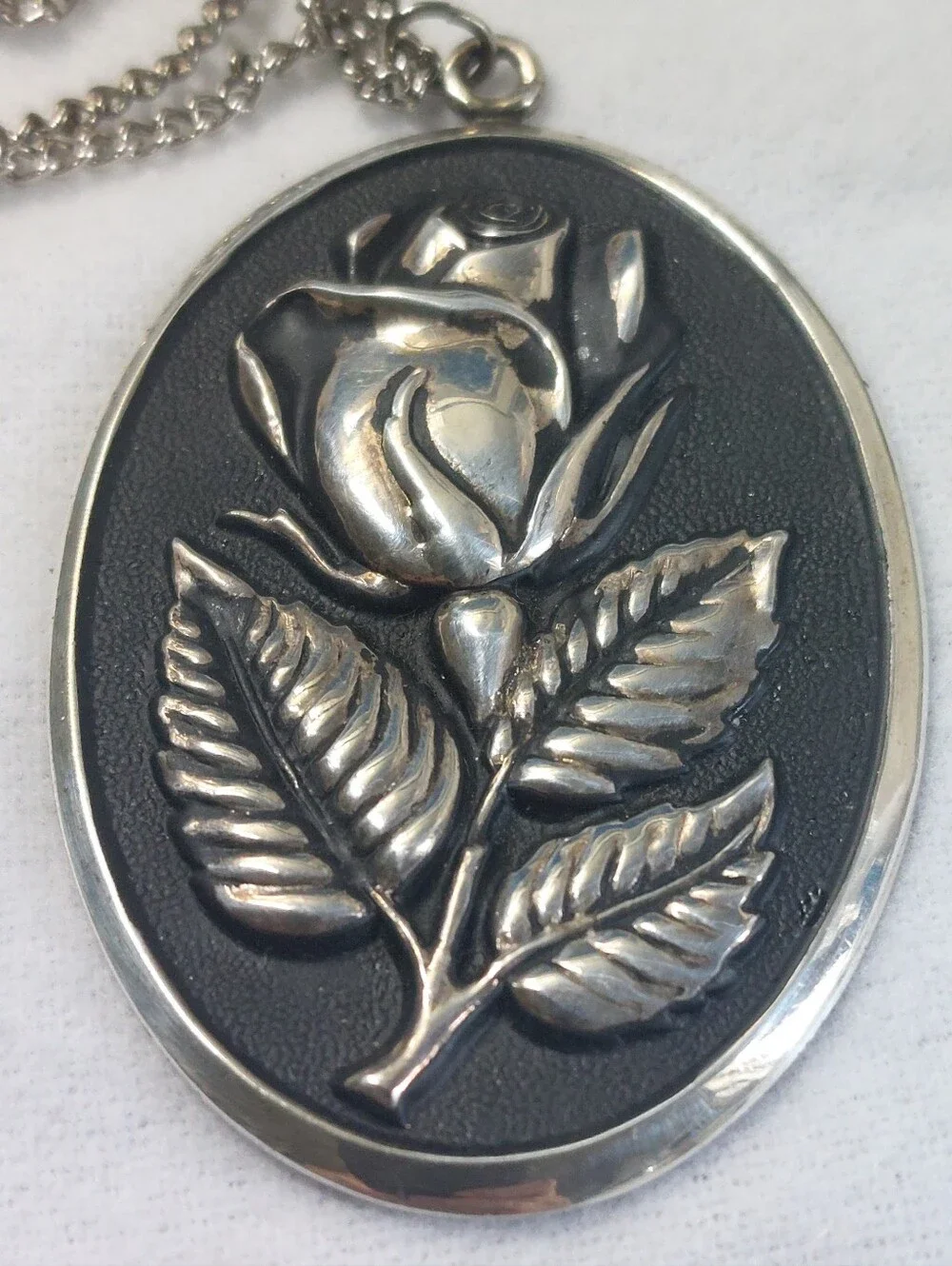 Vintage International Sterling Silver Oval Repoussé Rose Pendant Necklace